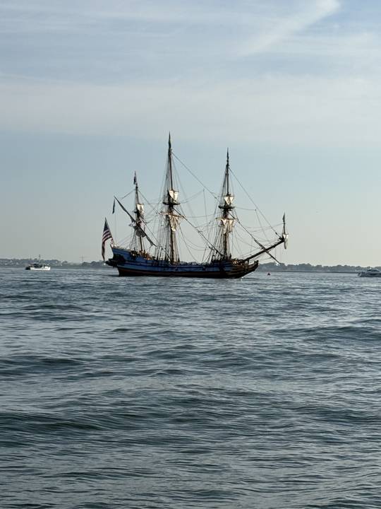 A square rigger anchored off the islands