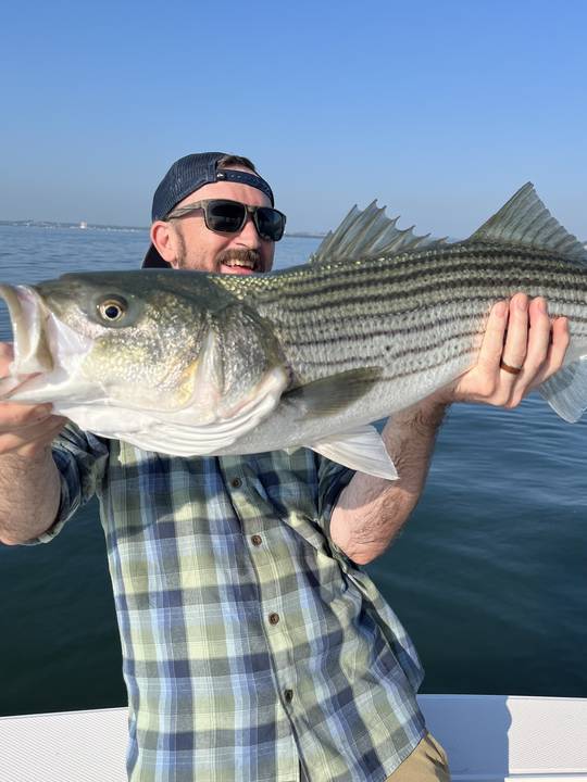 A thick striper held wide across the frame