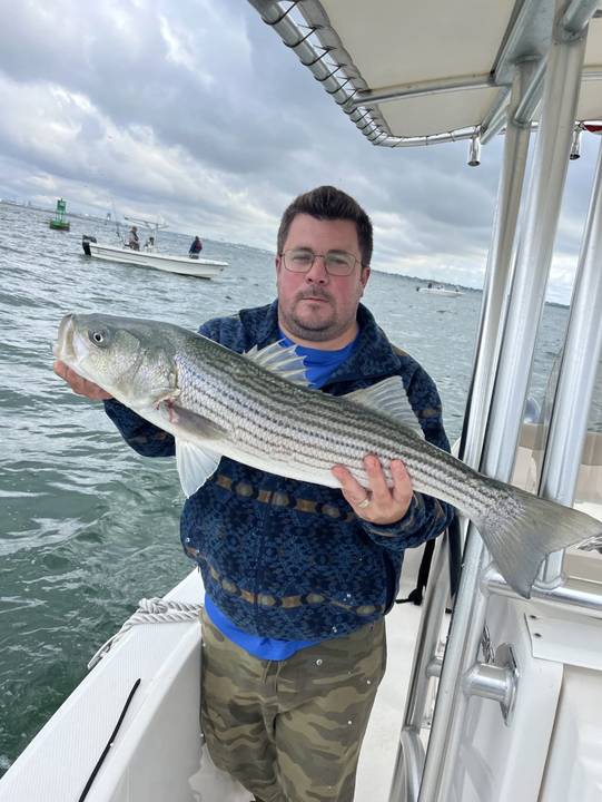 Striper held up with boats working the same water behind